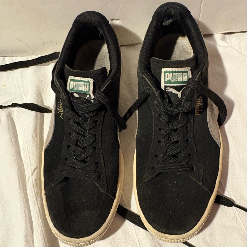 Puma women’s  Black and White Suede Sneakers